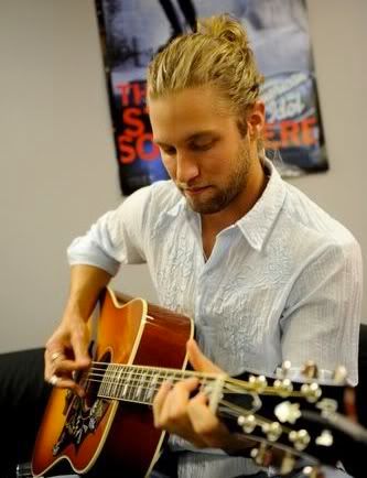 Casey James pulled back/ponytail hairstyle