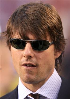 Tom Cruise hairstyle with full bangs. He preferred a classic tapered hairdo 