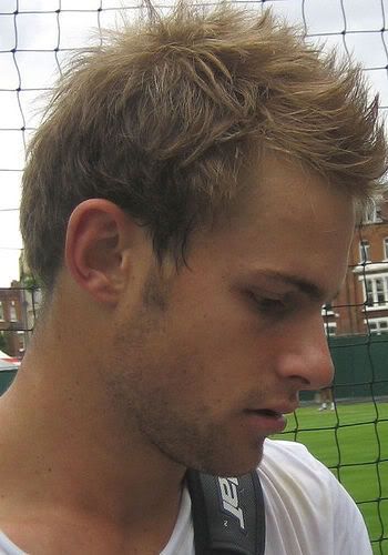 andy roddick hair transplant. Andy Roddick with his