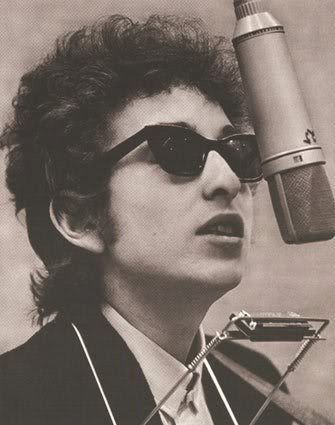 Bob Dylan hairstyle. Kids in the 60′s grew up listening to him.