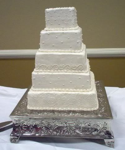 If square cake is presented then silver square wedding cake stands 