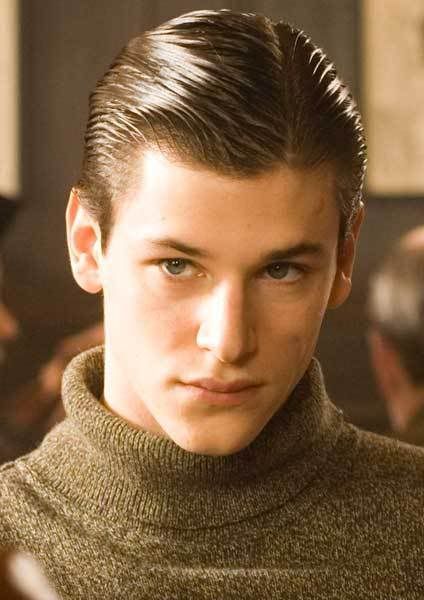 Gaspard Ulliel's side parted hairstyle. Gaspard's side parted style