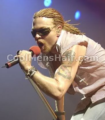 Image of Axl Rose long cornrow hair style.