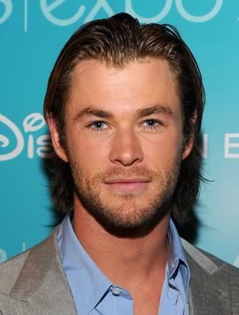 Pic of Chris Hemsworth comb back hairstyle.