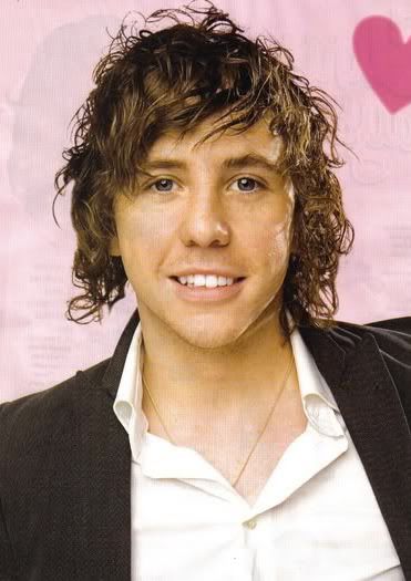 Photo of Danny Jones curly hairstyle for men.