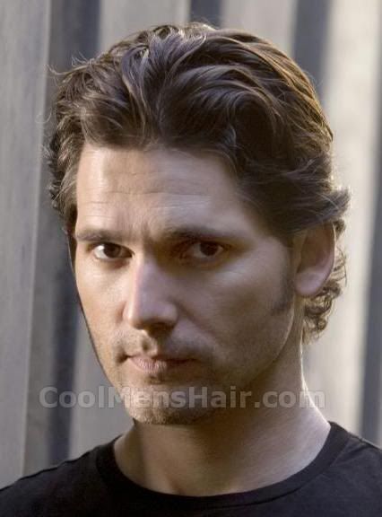 Image of Eric Bana longer curly hair.