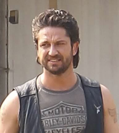 Picture of Gerard Butler slick back hairstyle.