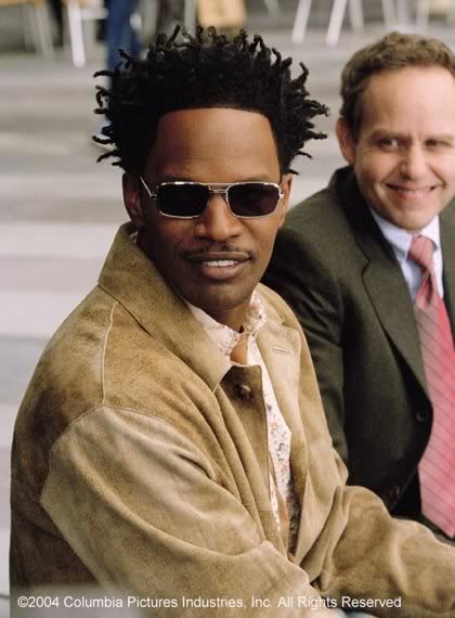 Photo of Jamie Foxx twist hairstyle for black men. 