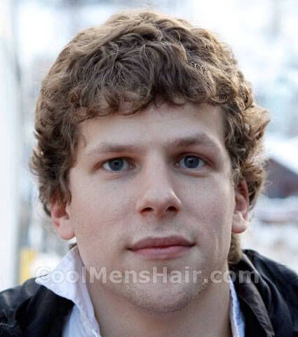 Picture of Jesse Eisenberg curly hairstyle.