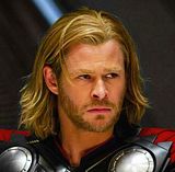Picture of Thor medium length hairstyle for men.