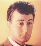 Photo of Buddy Holly hairstyle.