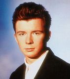 Picture of Rick Astley 80s hairstyle.