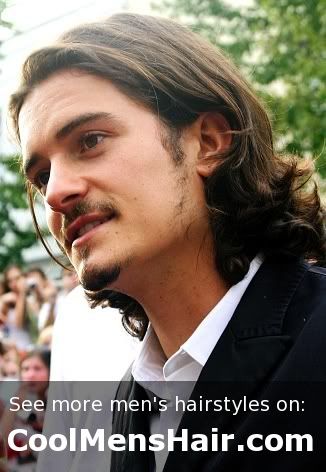 Orlando Bloom's long layered curly hairstyle